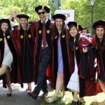 A group of GSE graduates posing together.