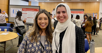 Professor Yuki Yamazaki, Ph.D., and third-year Counseling Psychology Ph.D. student Zainab Raza stood together smiling