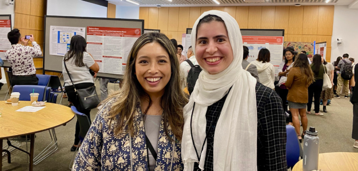 Professor Yuki Yamazaki, Ph.D., and third-year Counseling Psychology Ph.D. student Zainab Raza stood together smiling