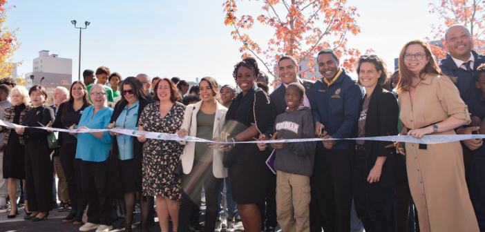 group of Fordham stakeholders celebrating ribbon cutting